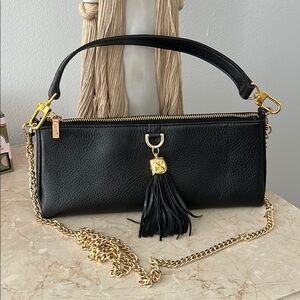Elegant Black Leather Handbag with Gold Accents